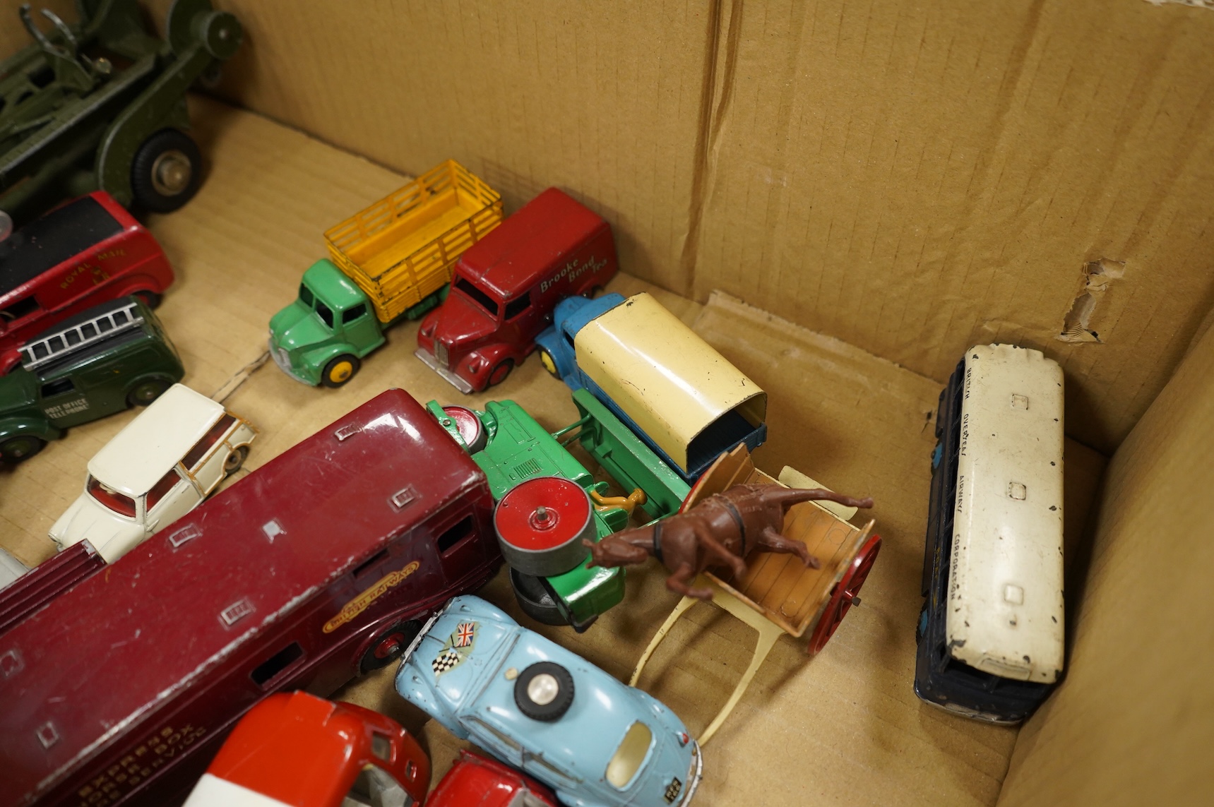A collection of thirty-five Dinky Toys and five Spot On diecast vehicles, including; a Foden tanker, Leyland octopus, Maudsley horsebox, telephone service van, Royal mail van, and a selection of other cars and commercial